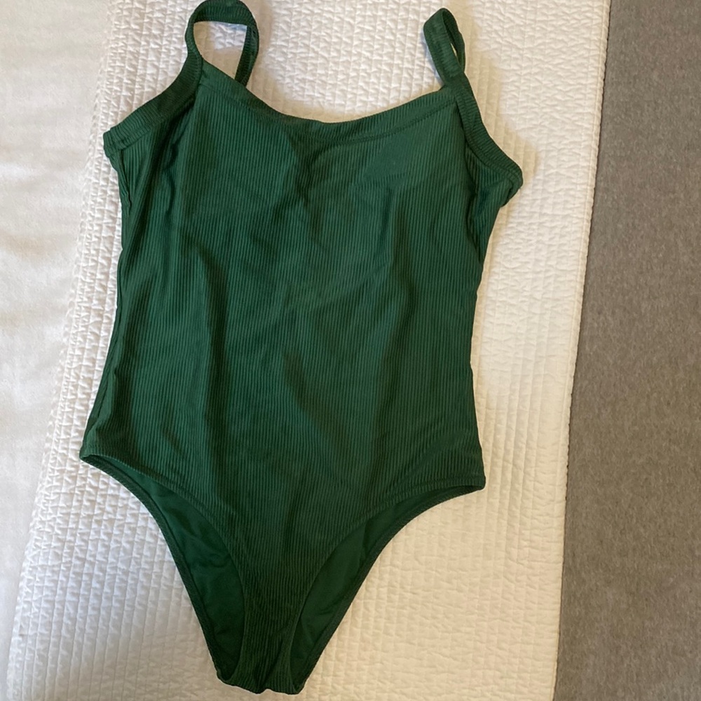 Emerald green one piece bathing suit.